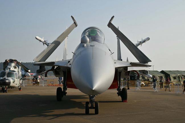 习近平亲自捧场  为何国防部记者会却只字不提