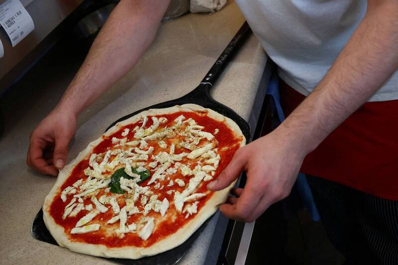 美军攻击委内瑞拉前，五角大厦附近披萨店的生意突然大幅上升。披萨示意图。（路透）